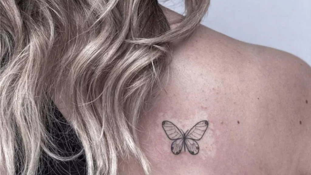 Black simple butterfly tattoo