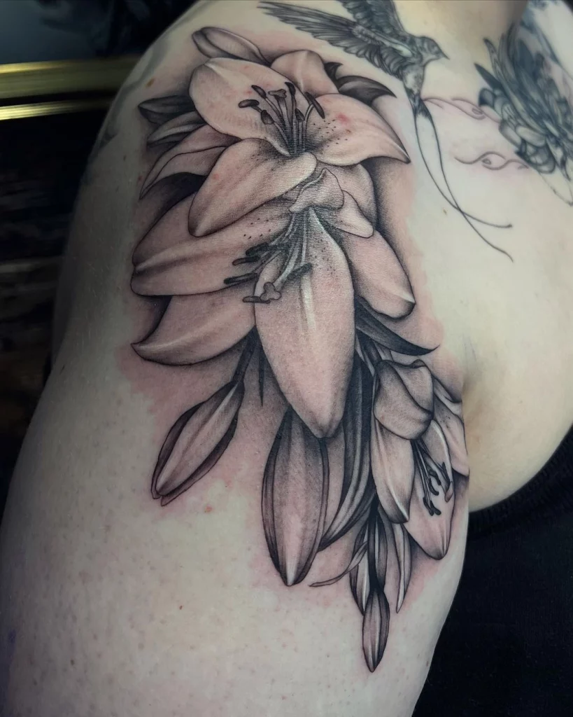 Lilies tattoo on shoulder