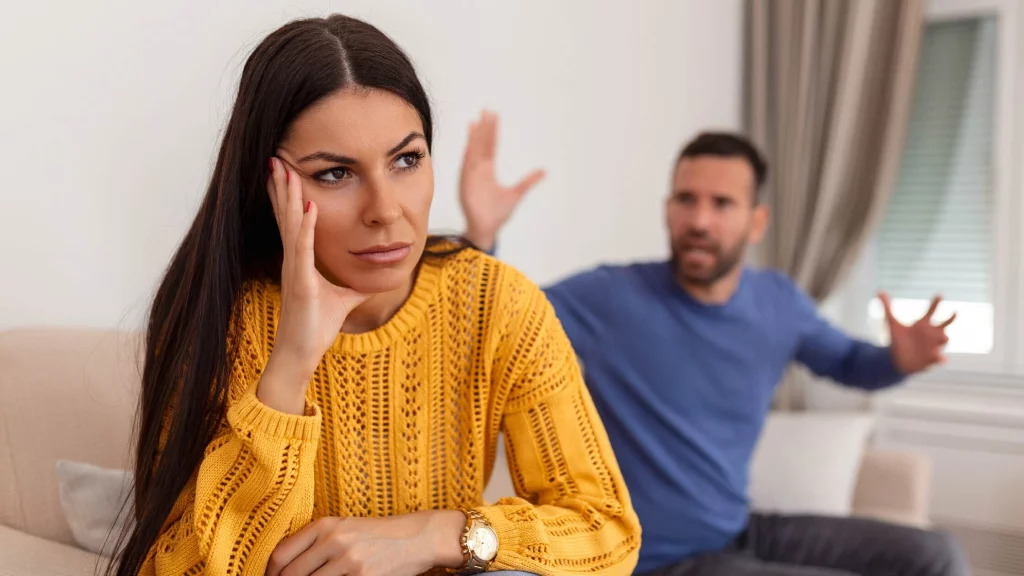 a man fighting with his girlfriend