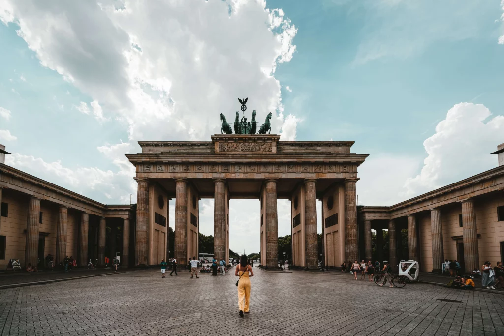 A woman standing near a building