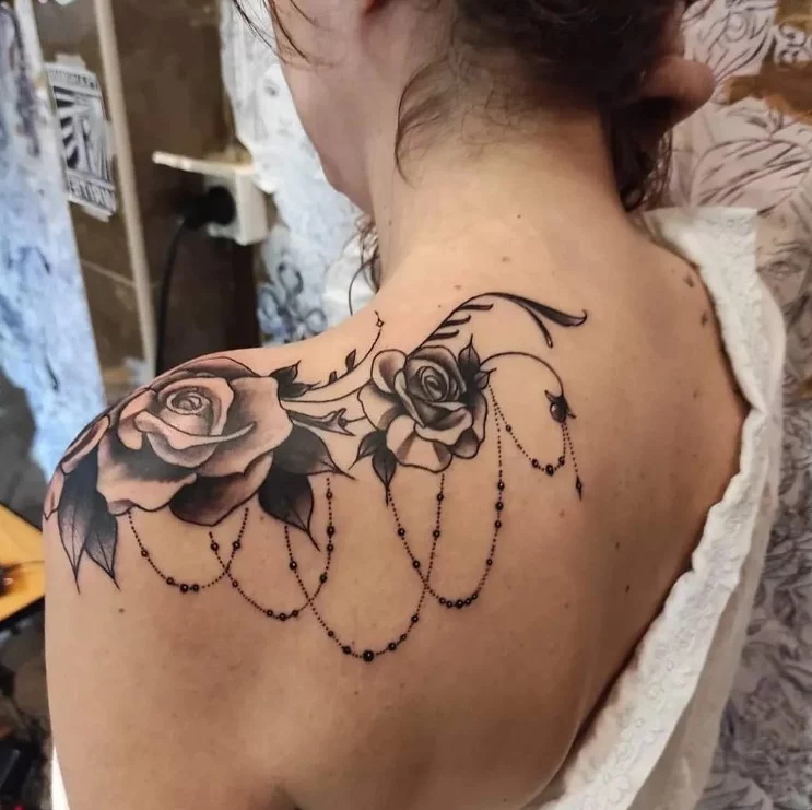 rose flower shoulder tattoo