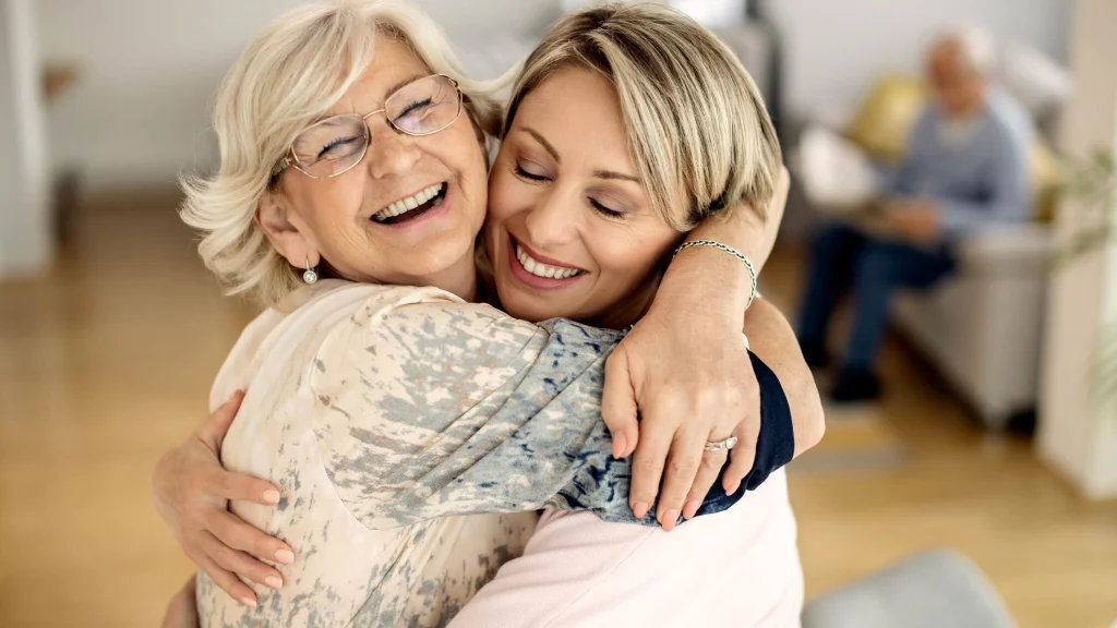 mother and daughter laughing together 