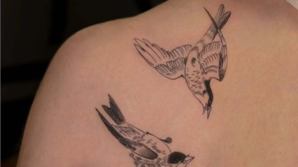 Two birds shoulder tattoo