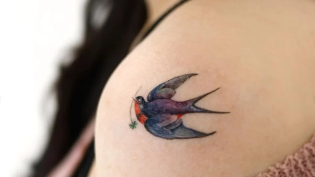 bird tattoo on shoulder
