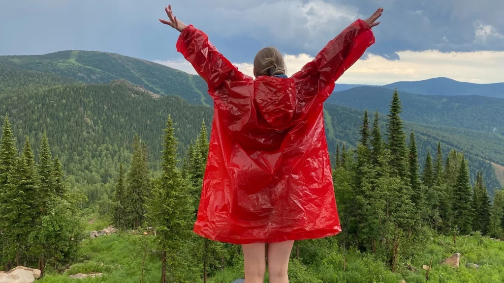 a girl in red raincoat