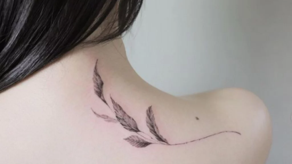 leaf tattoo on back shoulder
