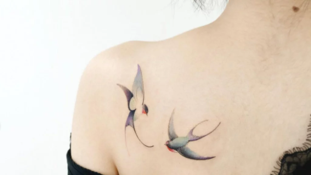 Birds tattoo on back shoulder