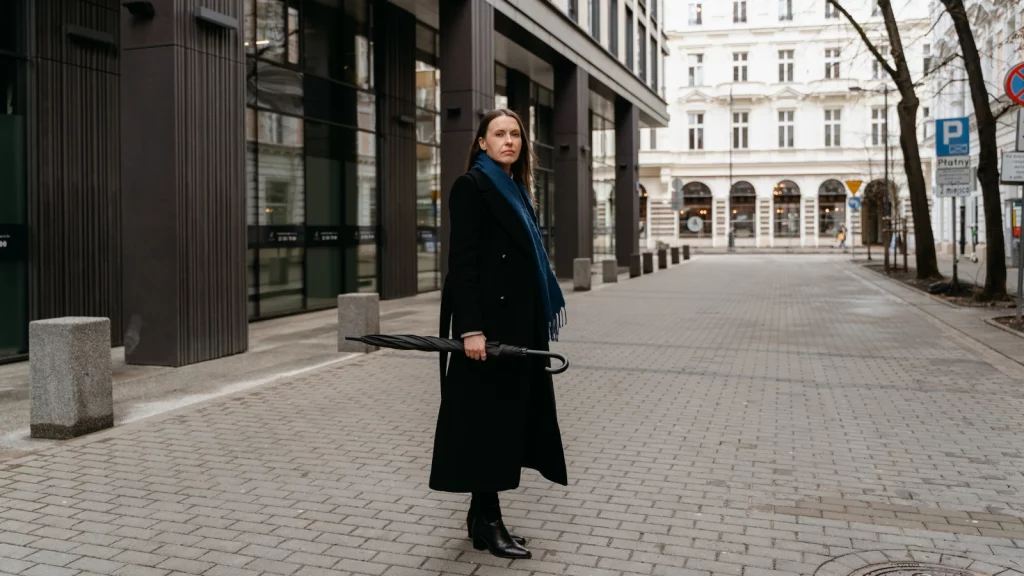 women in black coat