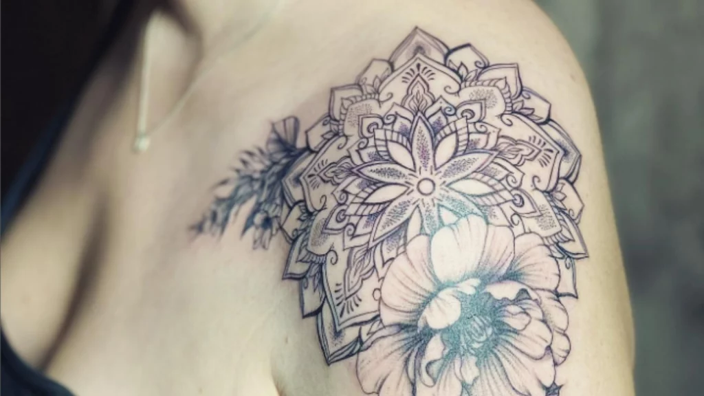 Mandala shoulder design with flower