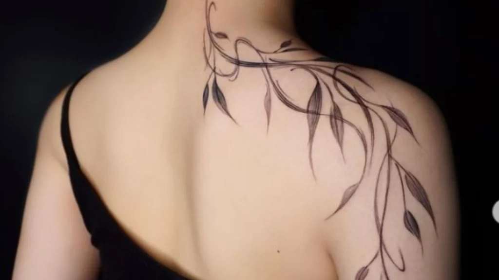 leaf tattoo from neck to back shoulder