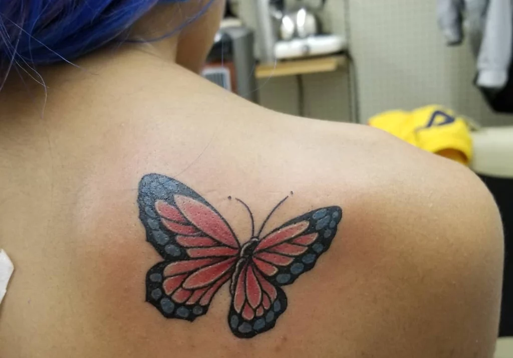 Butterfly Upper Shoulder Tattoo