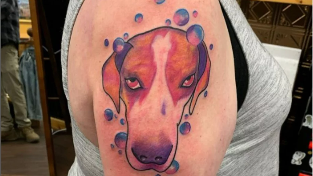 Dog tattoo on shoulder