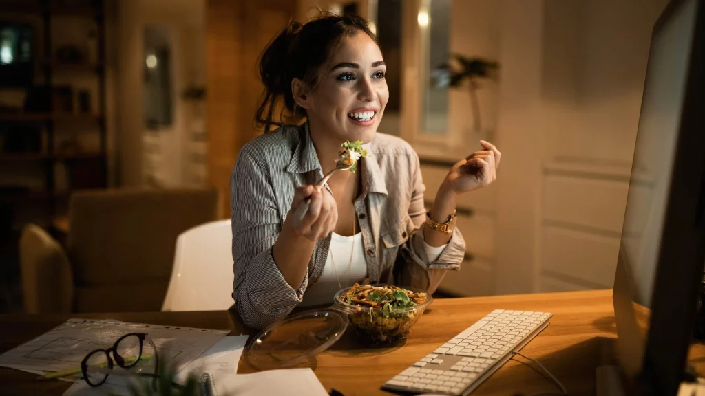 a girl eating late at night.