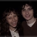 Elsie Pearls and Finn Wolfhard smiling and posing together.