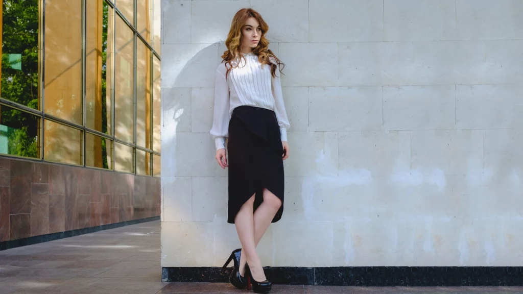 A girl wearing black high low skirt