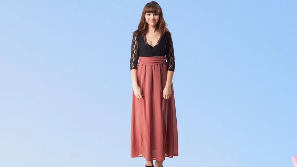 A girl wearing brown colored maxi skirt