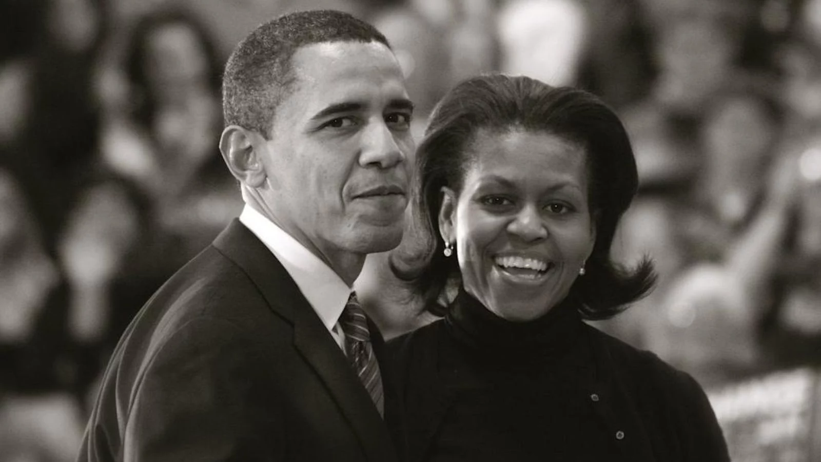 A black and white image of Barack and Michelle Obama. 