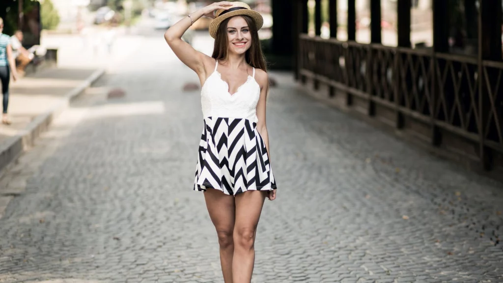 aa girl wearing black & white striped Mini Skirt