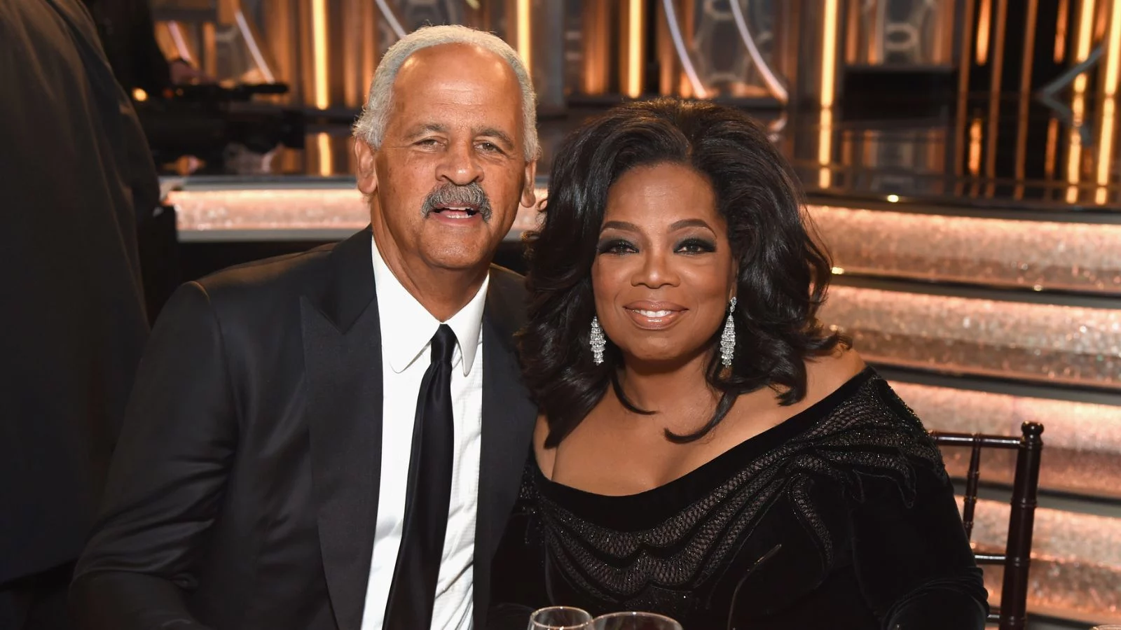 Oprah and Stedman posing together at an event. 