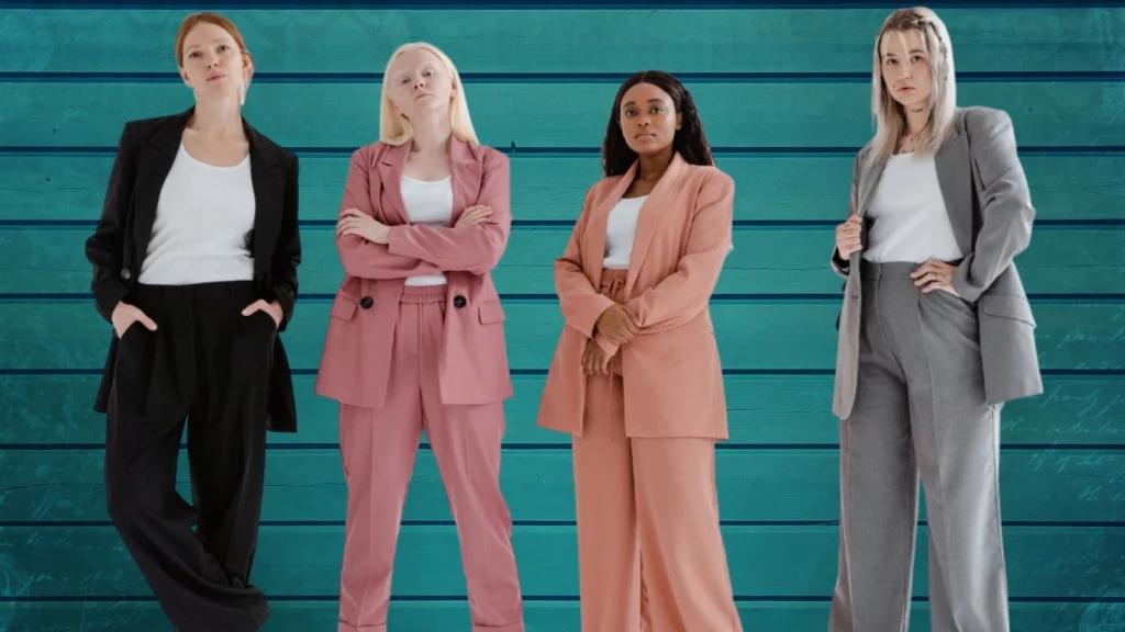 4 women wearing cooperate suits