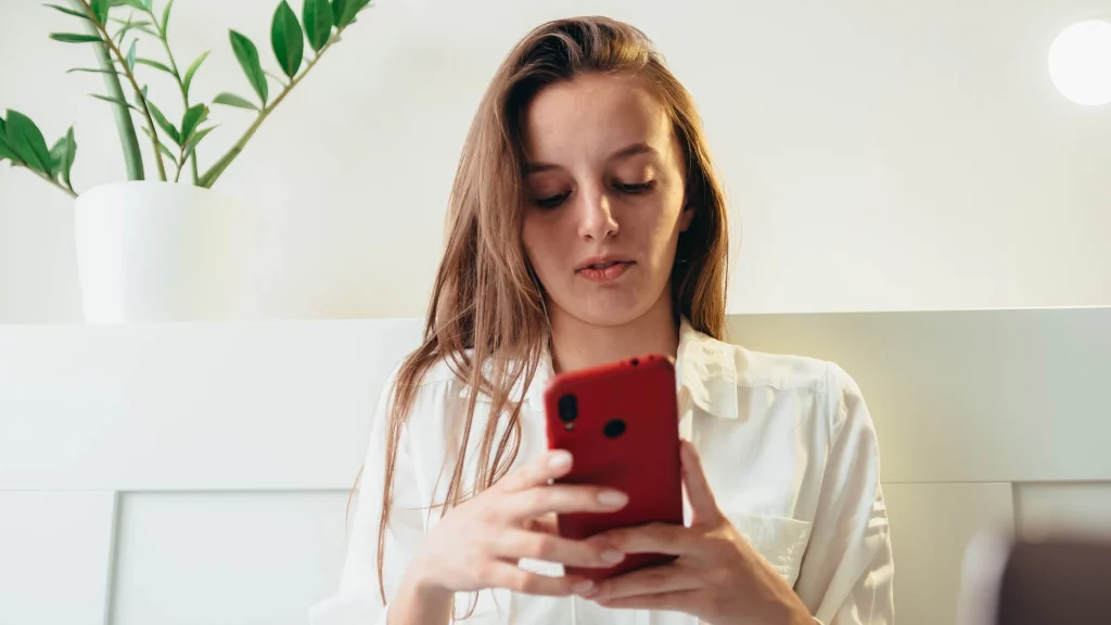 A girl looking into phone