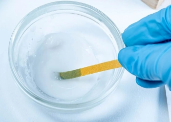 Lab dip sample tester checked in solution.