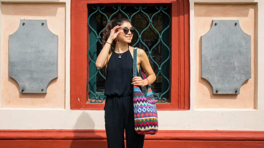 A girl wearing one piece jumpsuit in black color