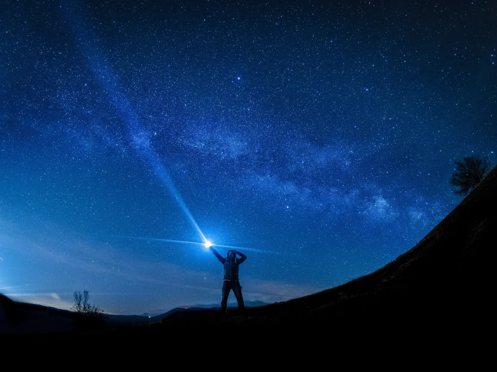 a man holding torch light