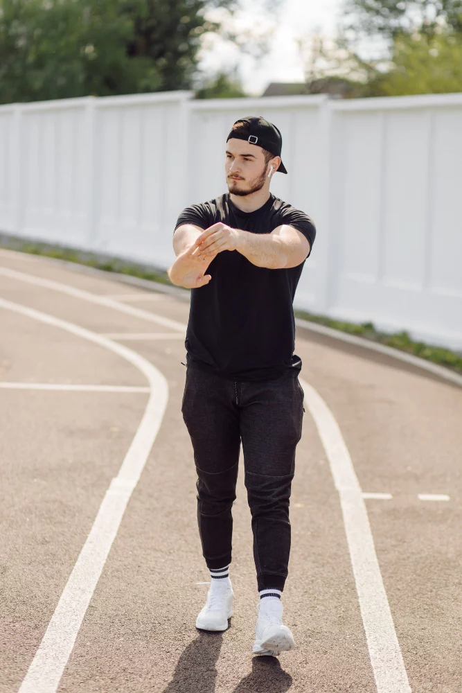 All black jogger outfit for men. 