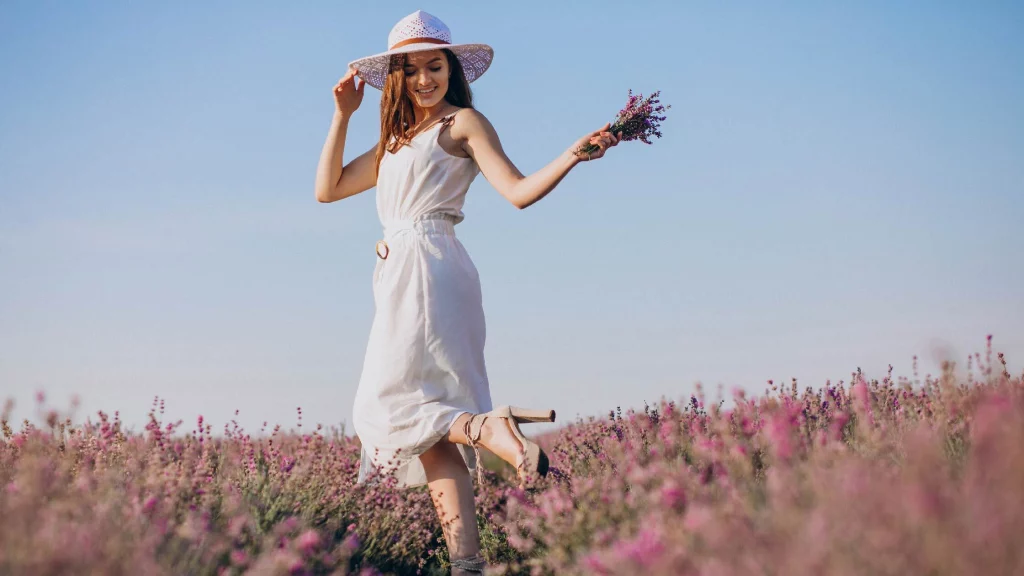 girl in white dress in a flower park