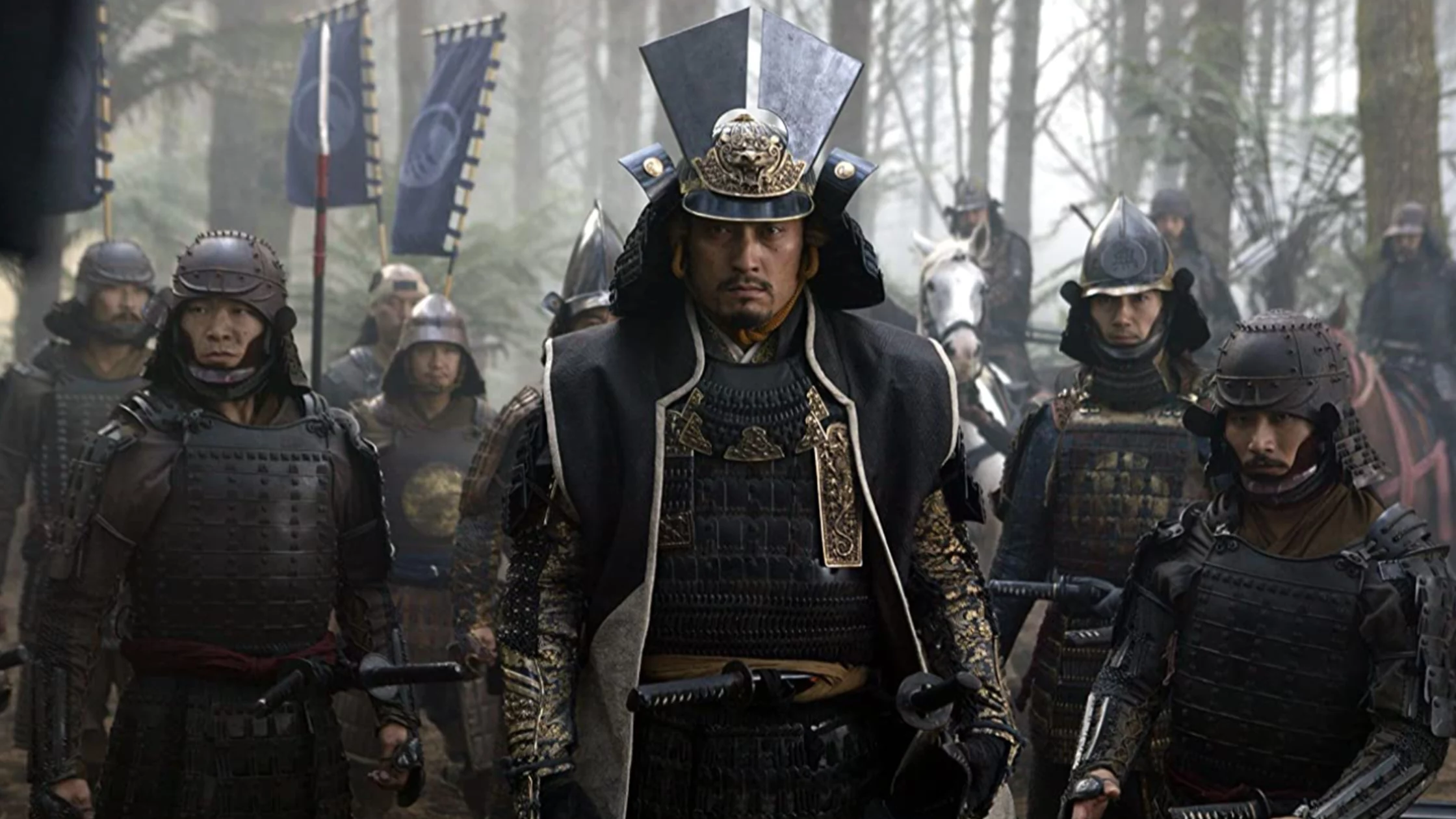 A samurai in a uniform with his army. 