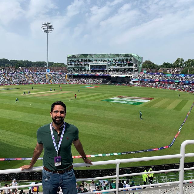 Asser Malik's age is 29 as of now and he is standing in the stadium.