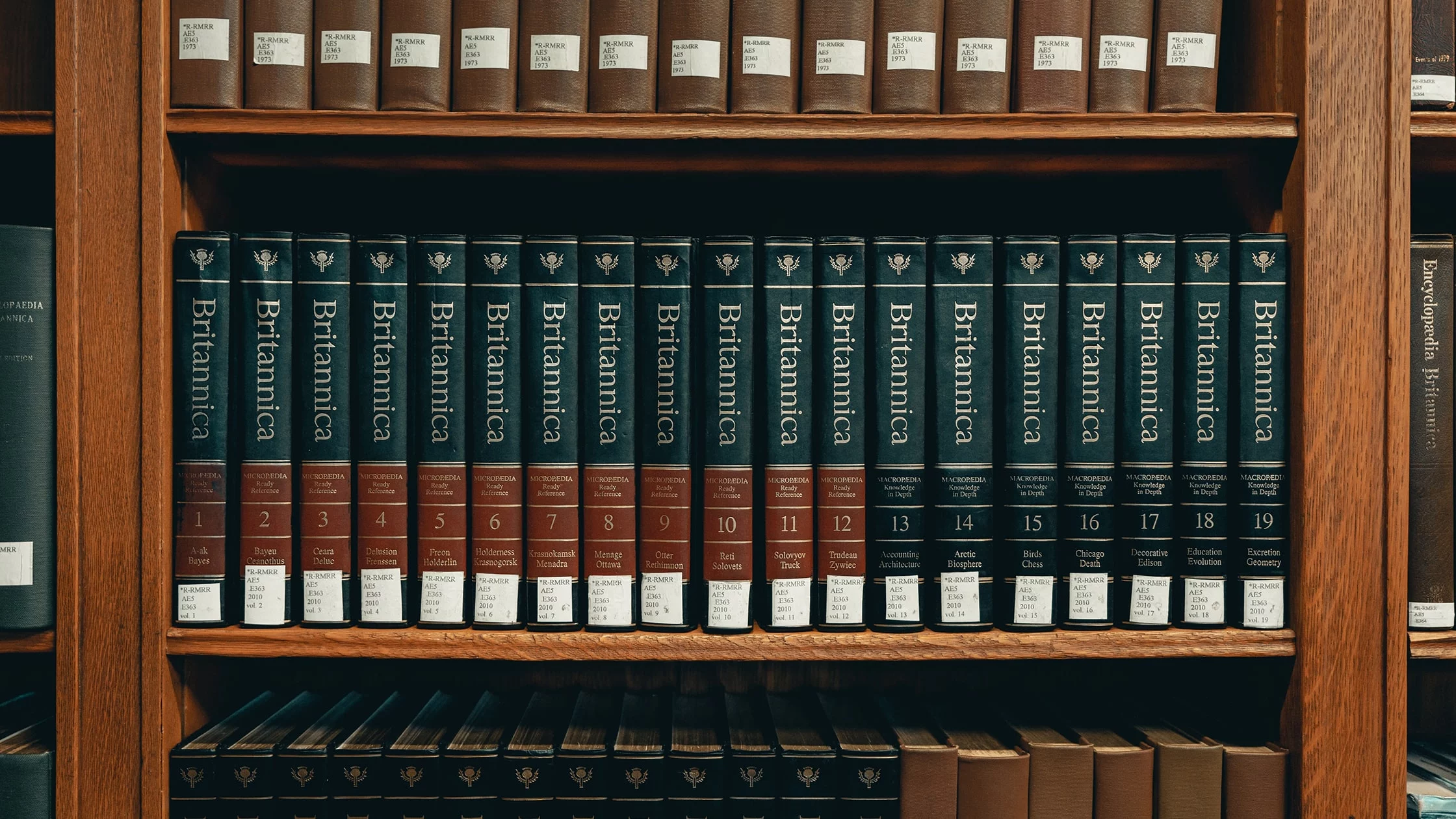Encyclopedias piled up together. 