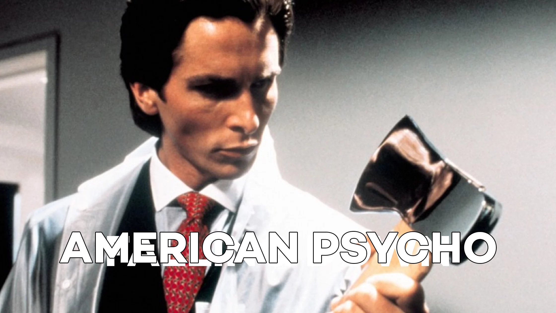 A still from American Psycho with a man holding a weapon. 