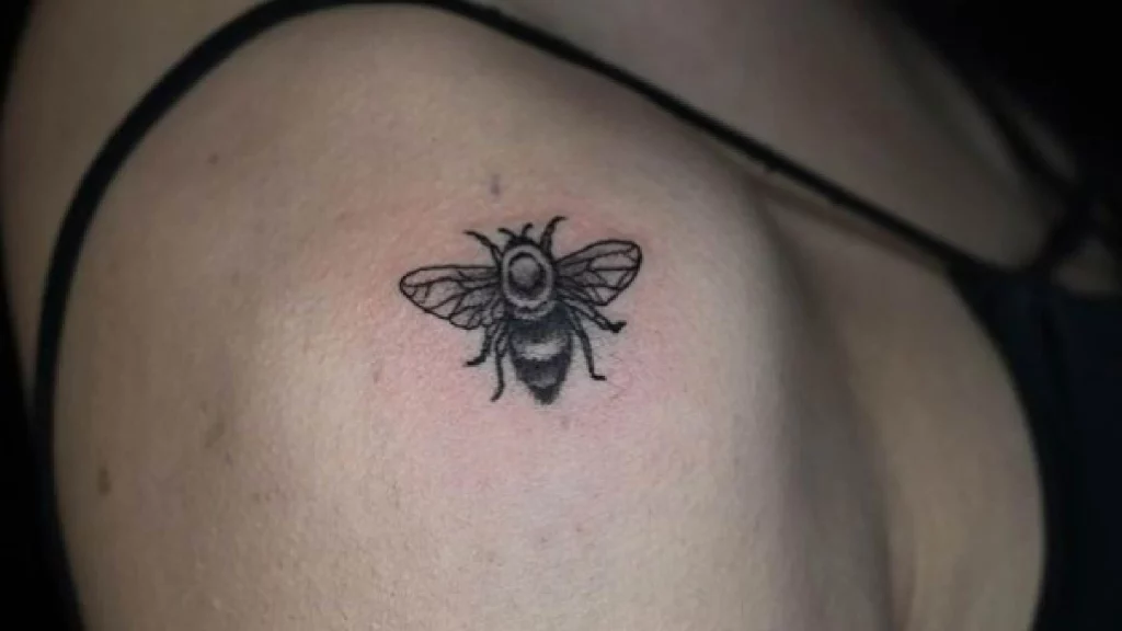 bee tattoo on shoulder