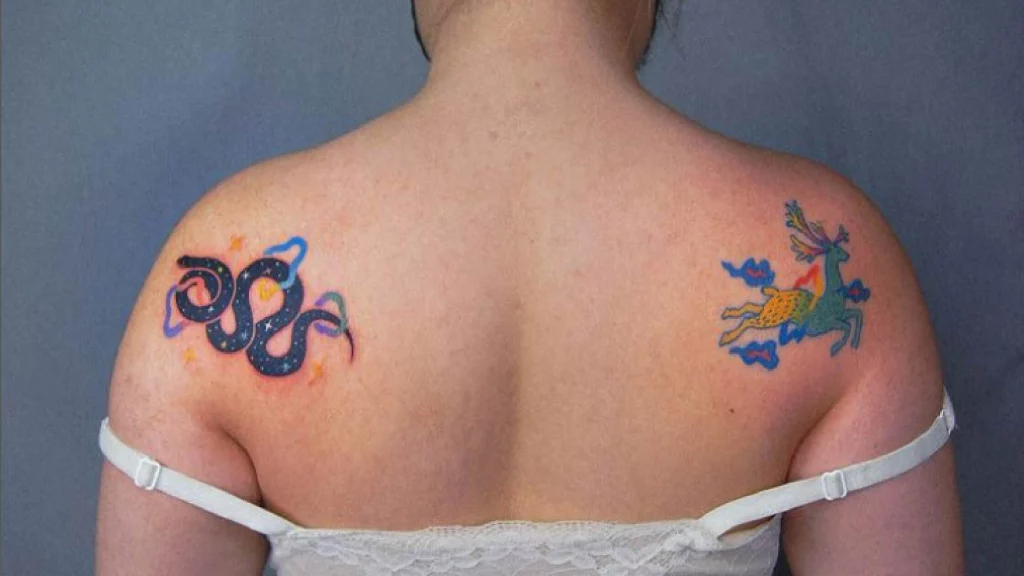 snake tattoo on back shoulder