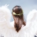 women wearing white angel wings