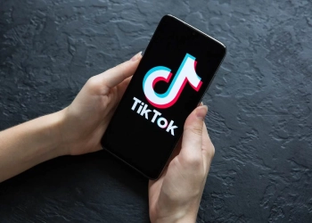 tiktok logo on a phone display
