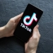 tiktok logo on a phone display