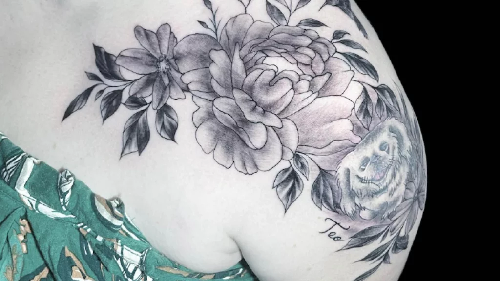flower tattoo in shoulder 