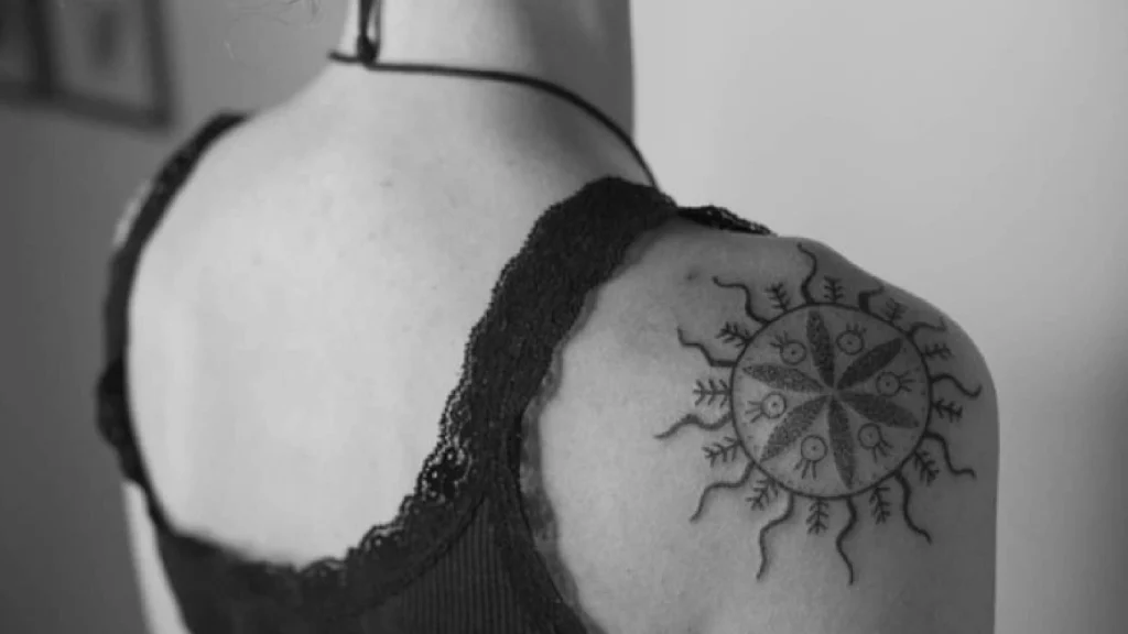 symbol tattoo on shoulder