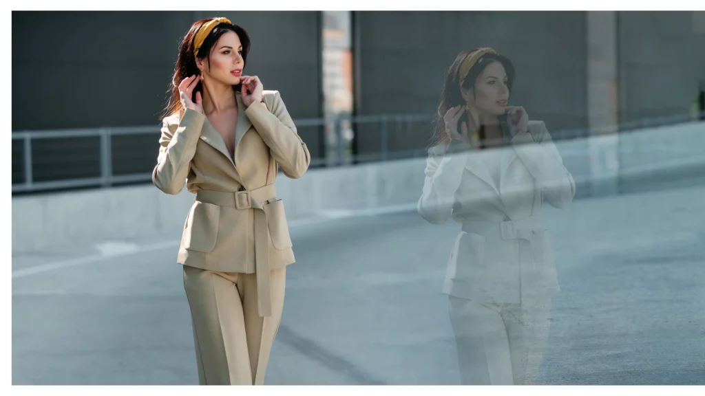 girl posing in grey suit