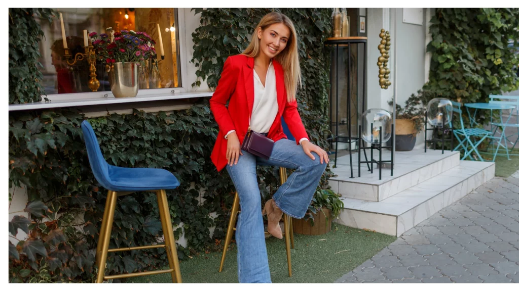 women smiling in red blazer